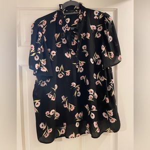 Ann Taylor Factory floral blouse. Size xl. Hip length. Ruffle collar.